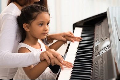 Children playing instruments with warm rhythm waves